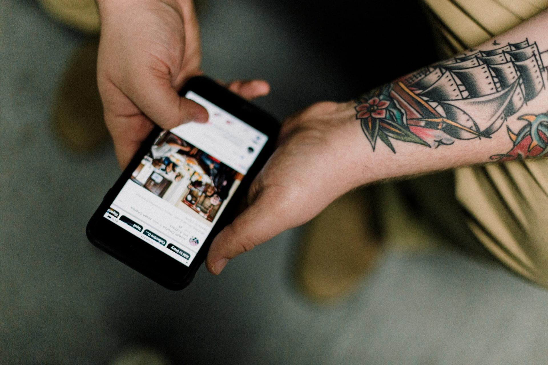 a user browsing through their facebook feed on the iPhone